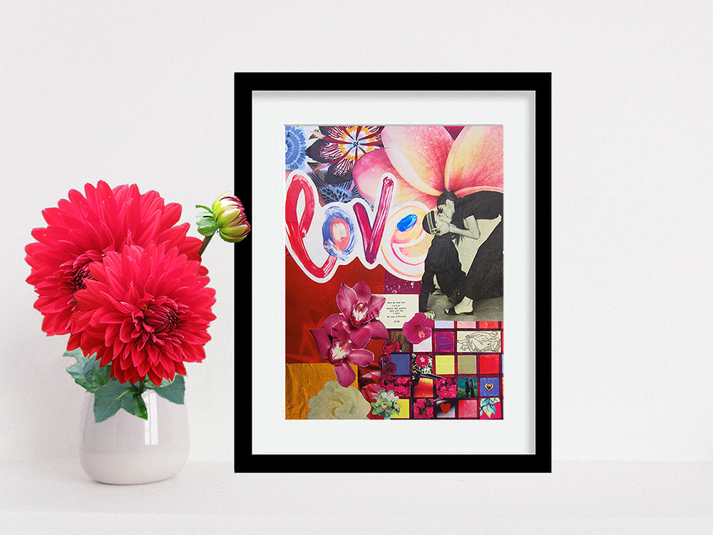 Love Collage 8x10 Art Print by Tanya Madoff shown in black frame next to bouquet of red flowers